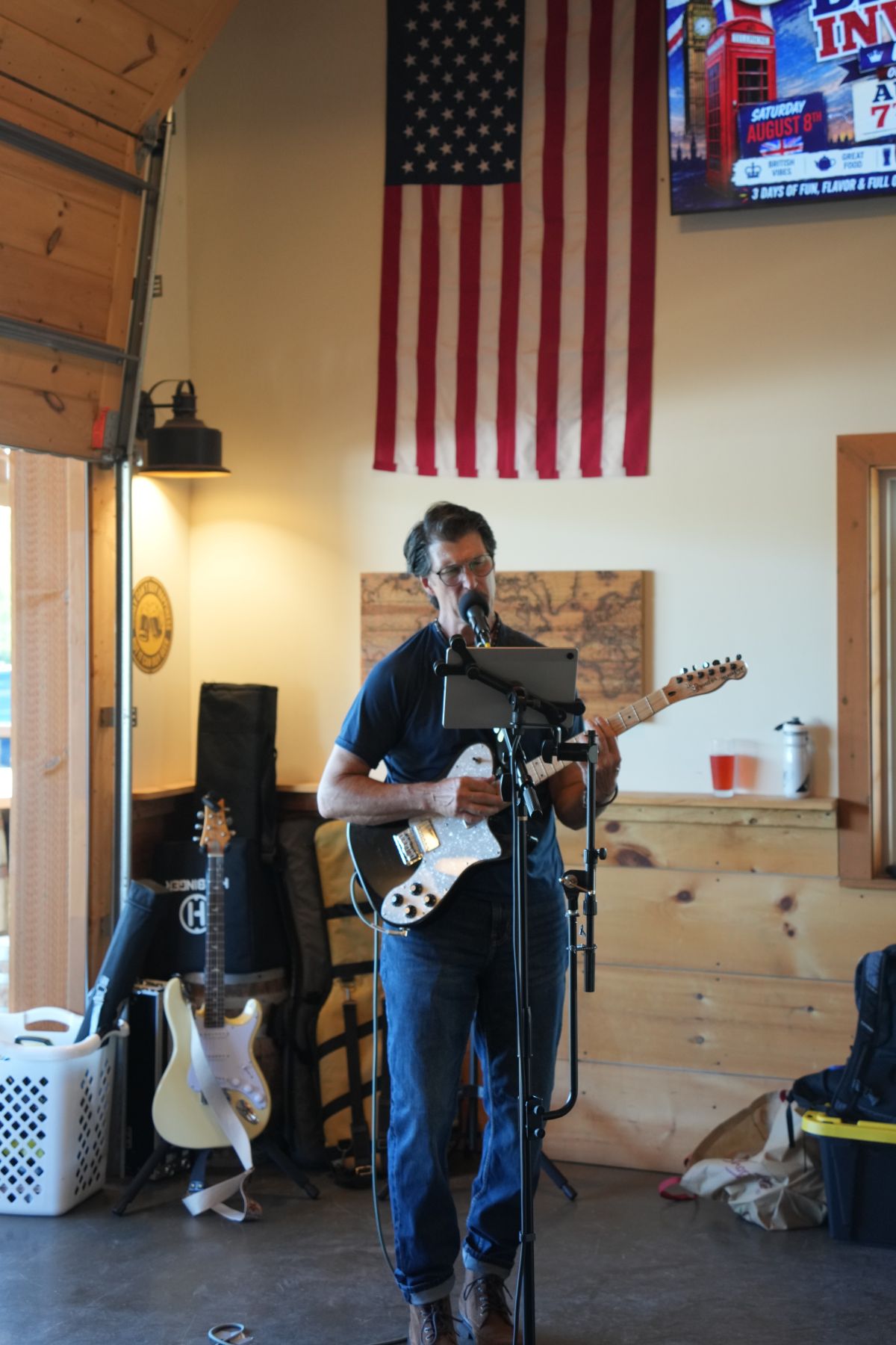 man performing on guitar