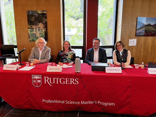 Panelists sitting at table