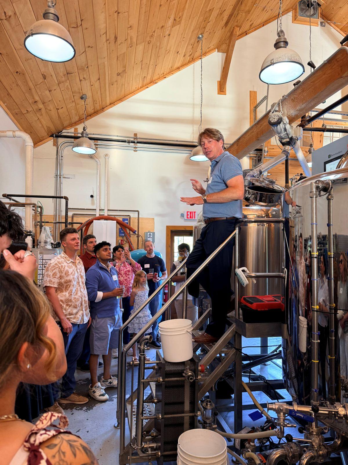 man giving tour of brewery