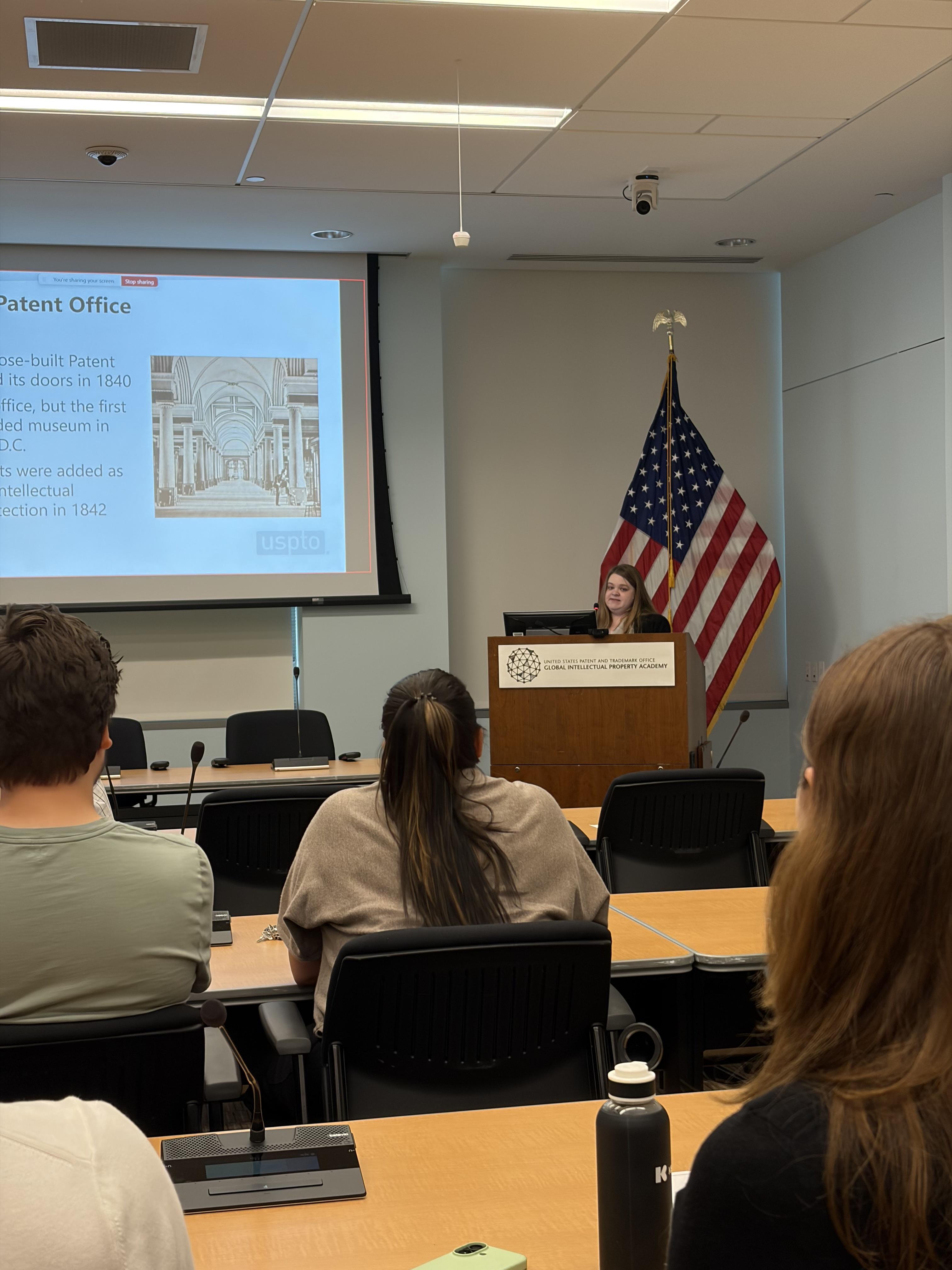 Woman standing at podium