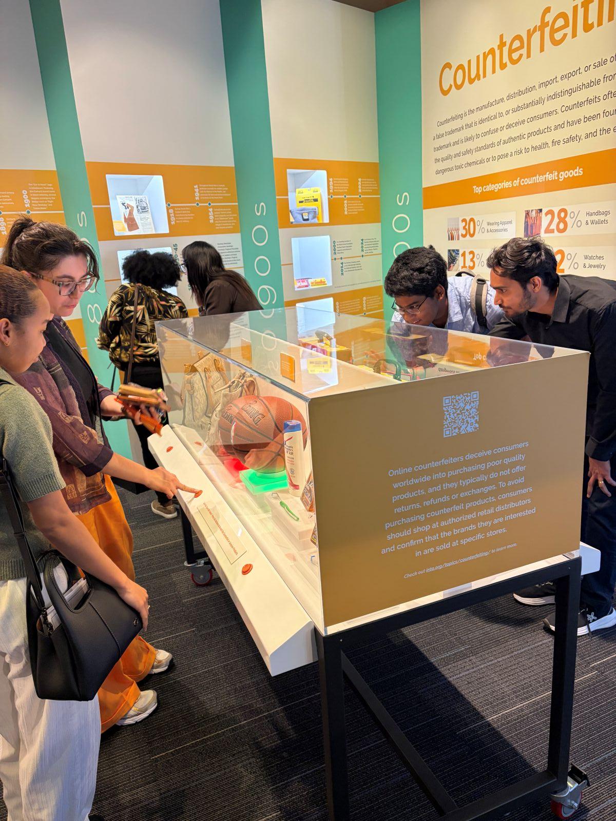 People standing around display
