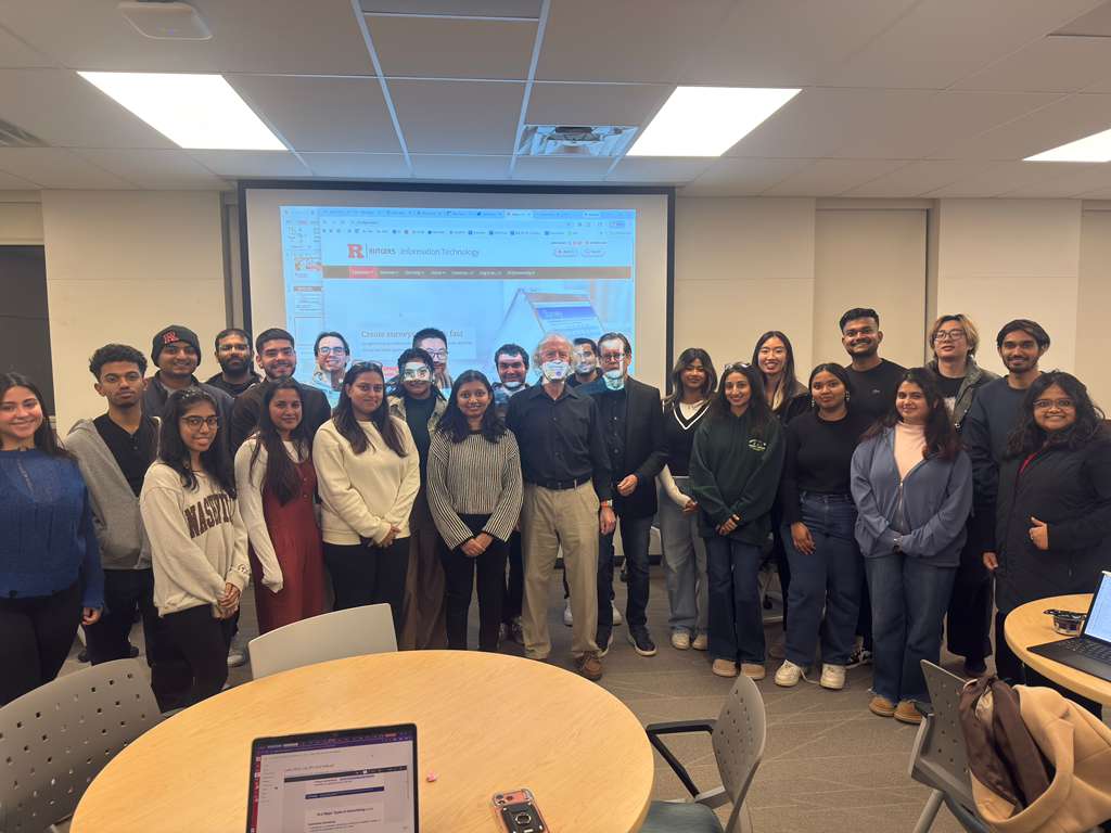 A picture of Rutgers students posing with their professor and Guest speaker