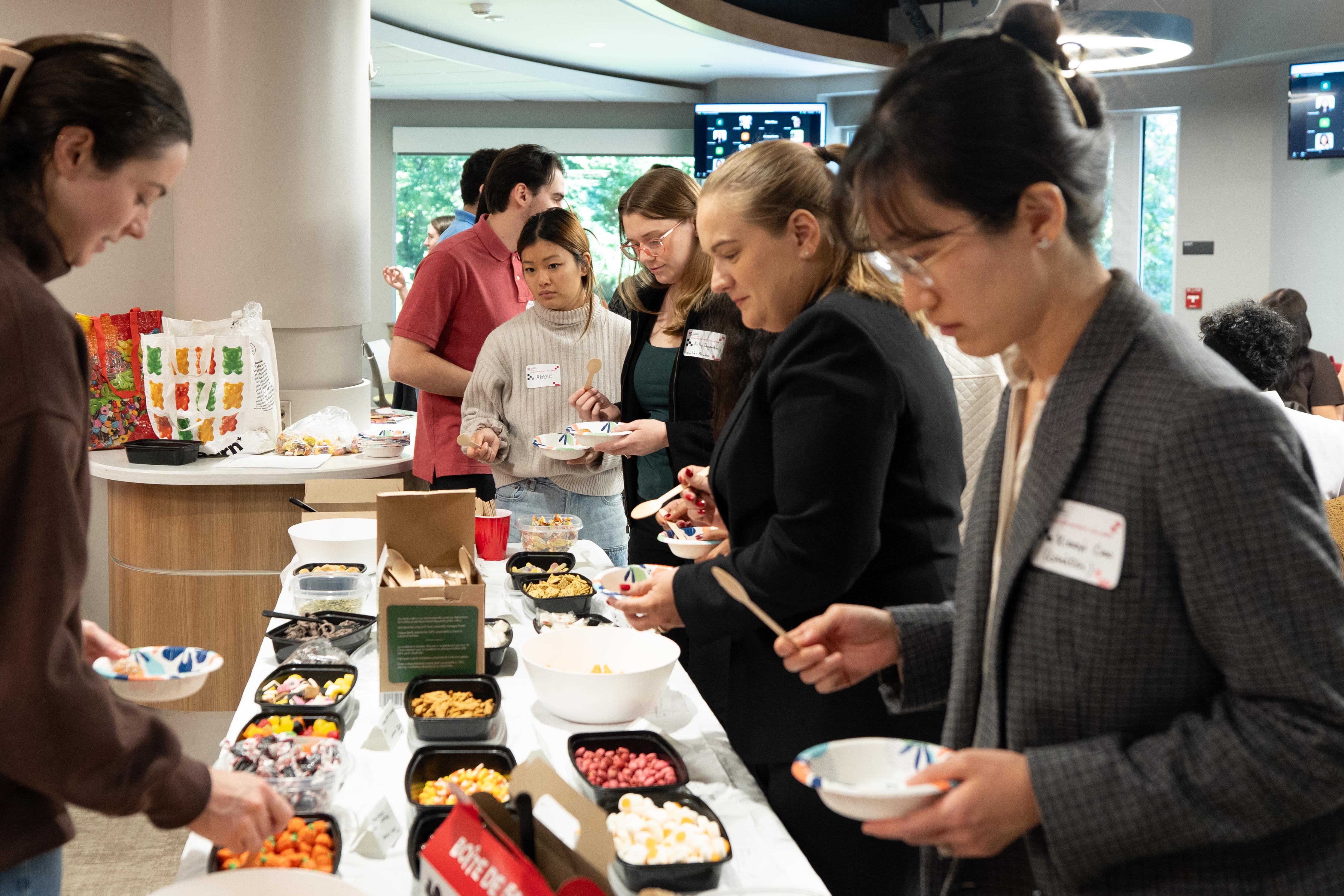 A group of people near the buffet