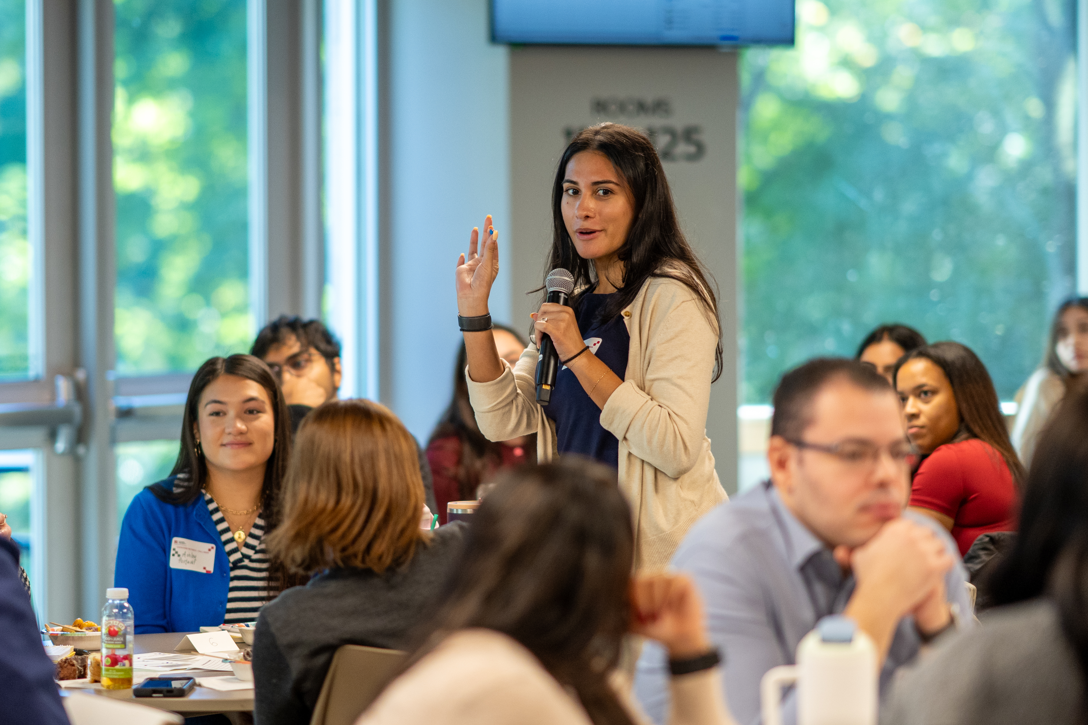 A student speaking during an event