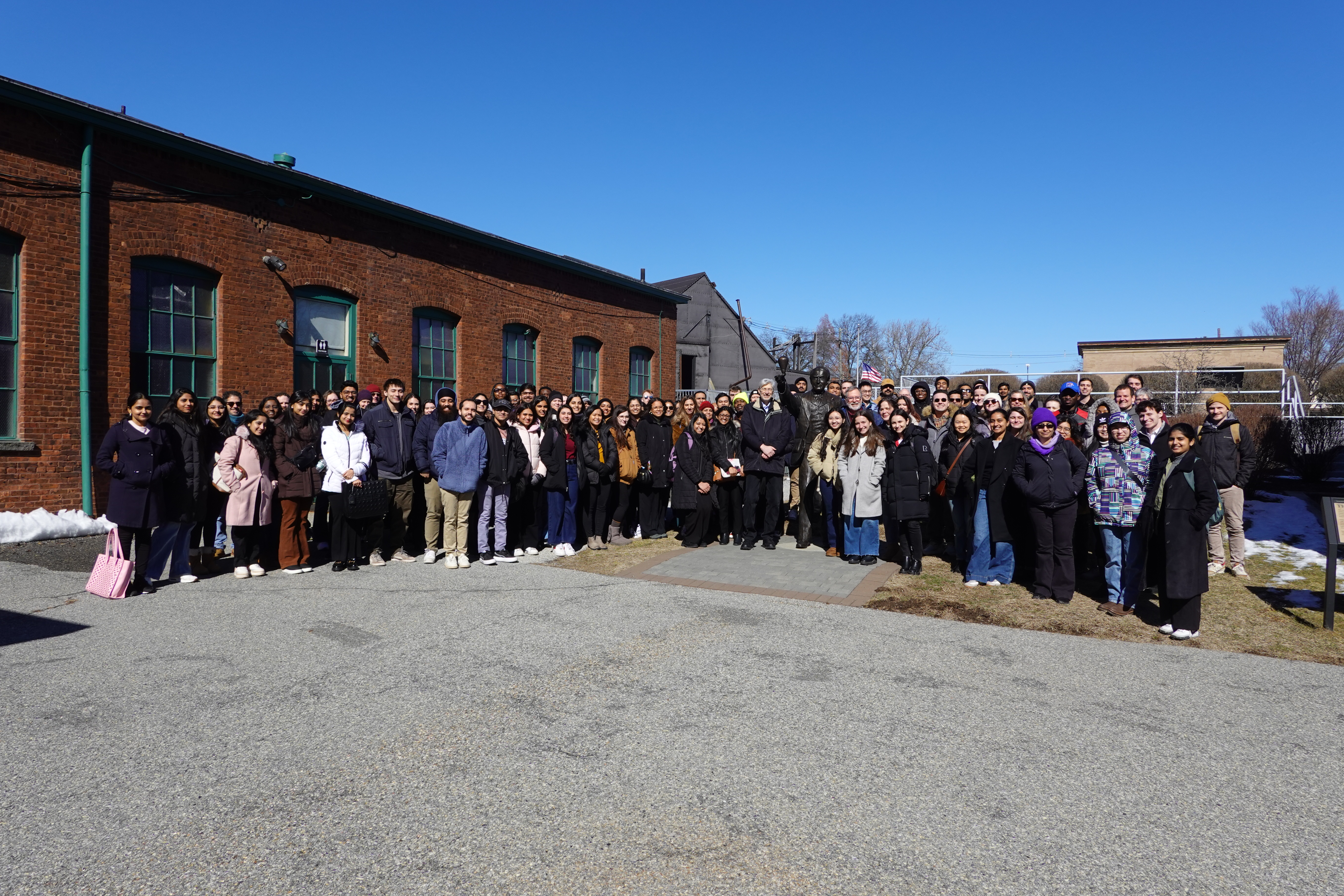 Group standing near Thomas Edison statue