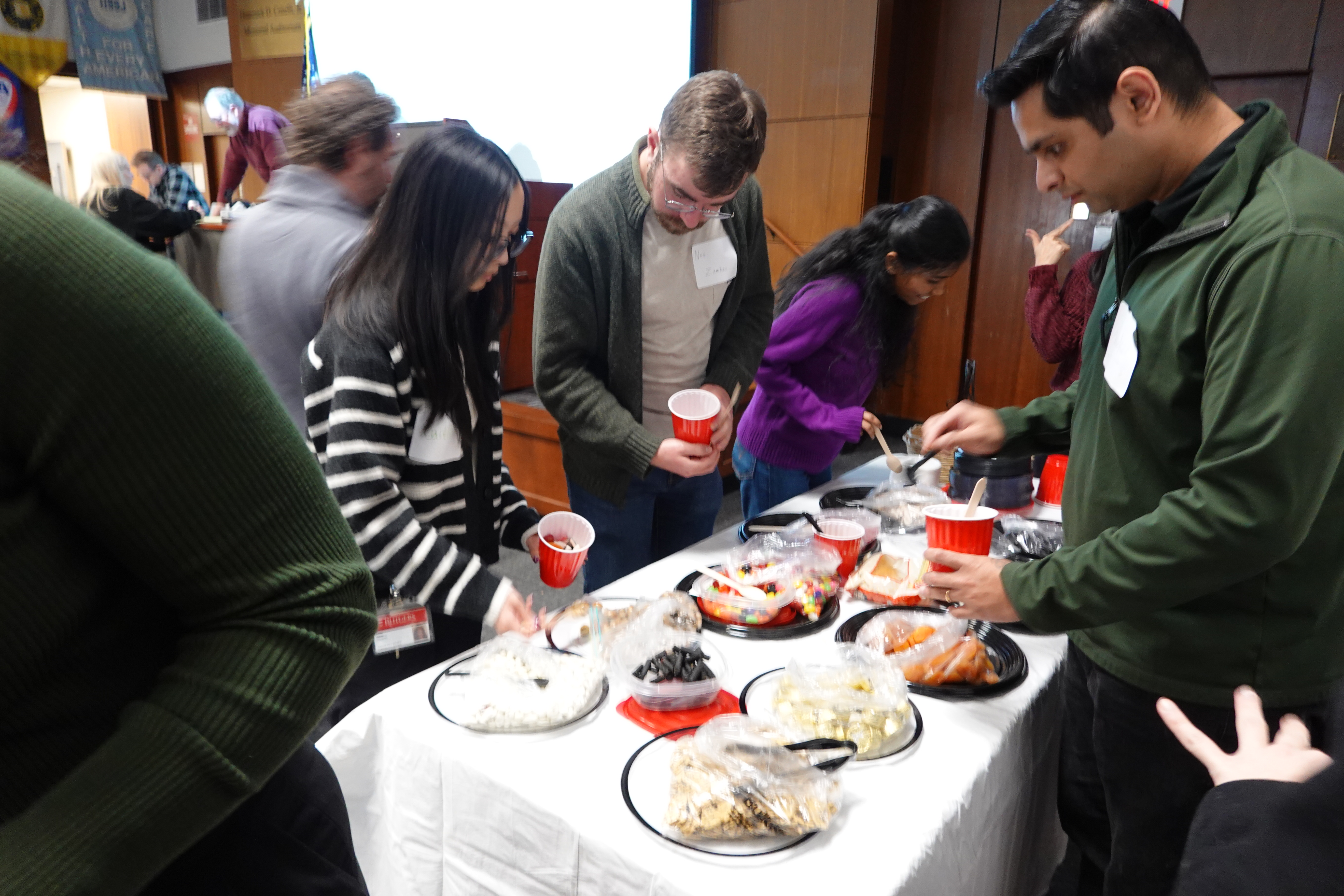 group picking up snacks