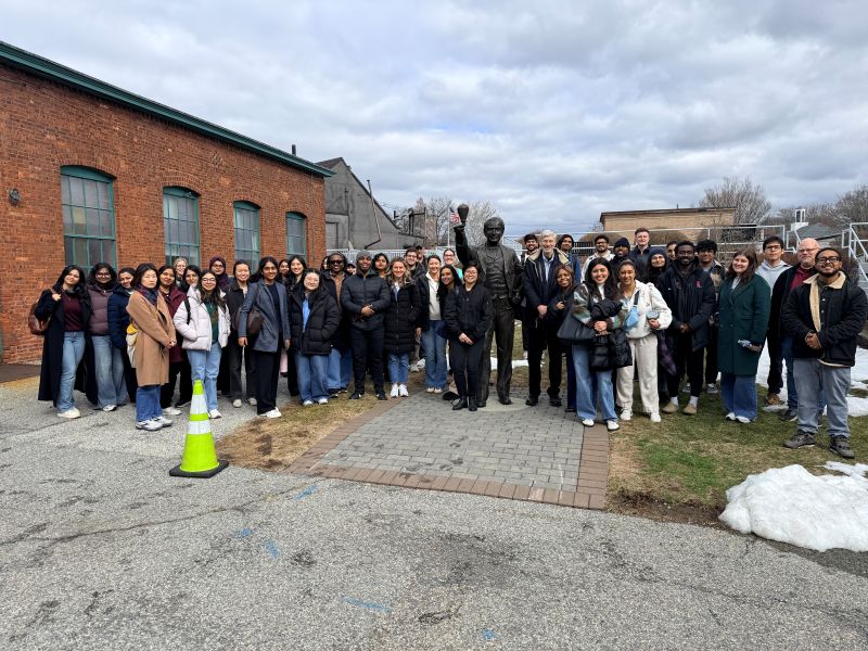 A group of students with their professor on a field trip