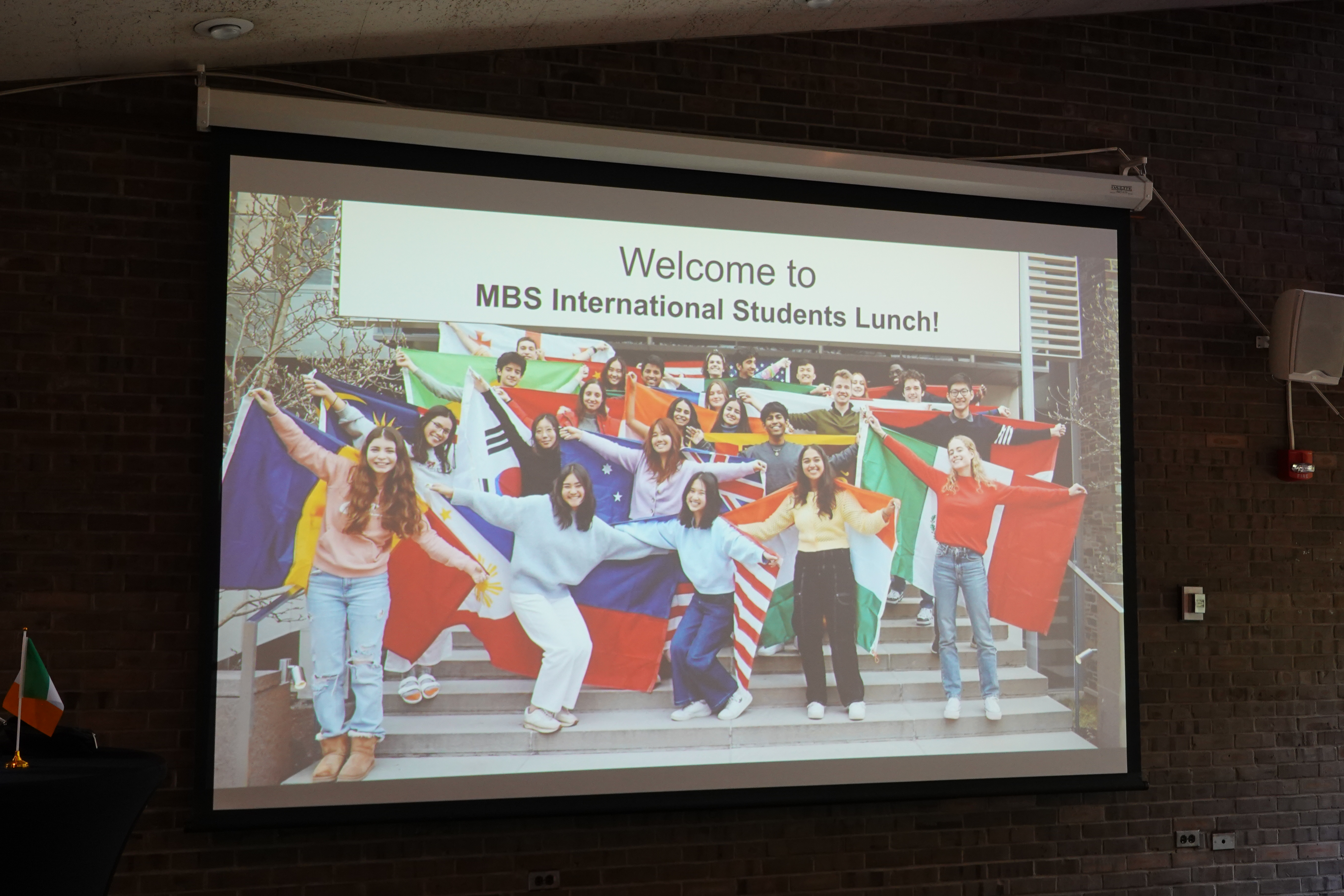 zoom screen with slide reading Welcome to MBS International Students Lunch