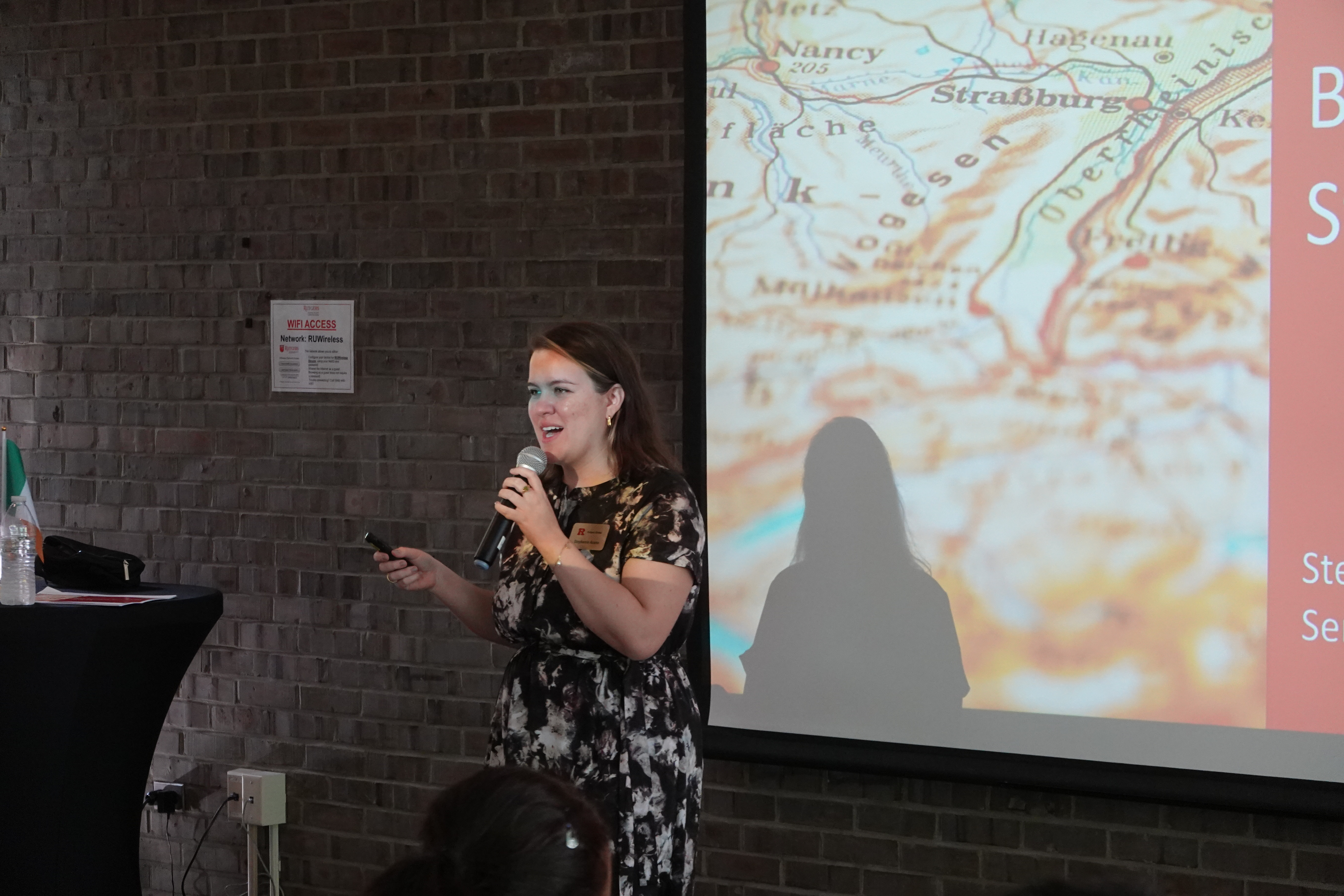woman speaking into microphone