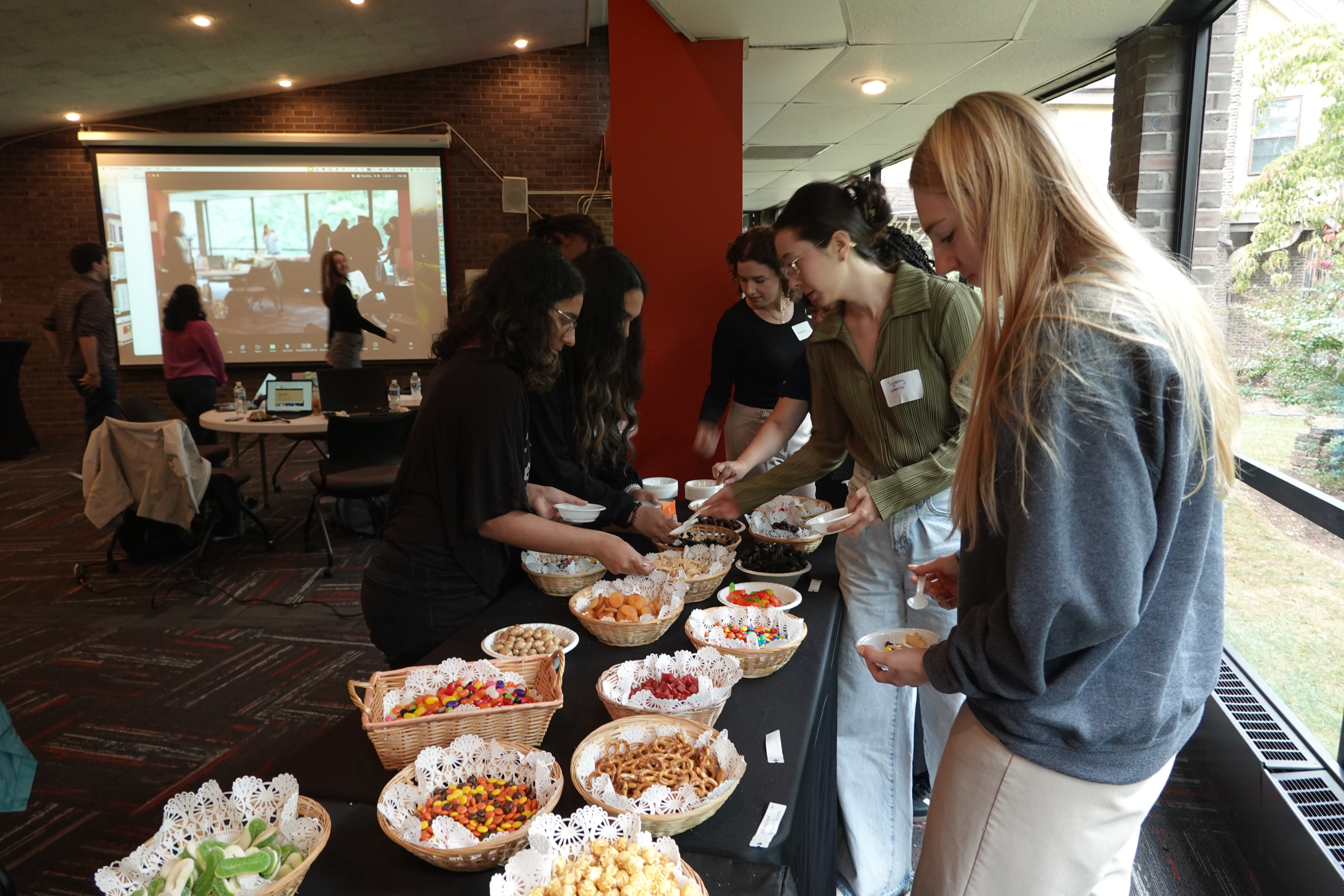 students taking food from stable