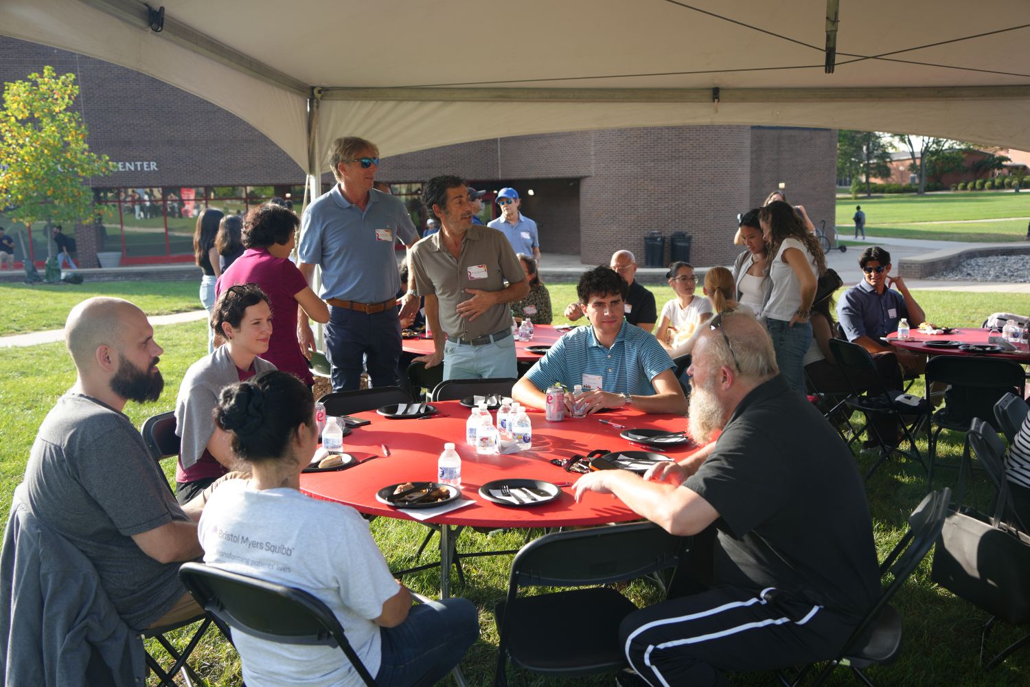 A group of people at a table having a candid conversation