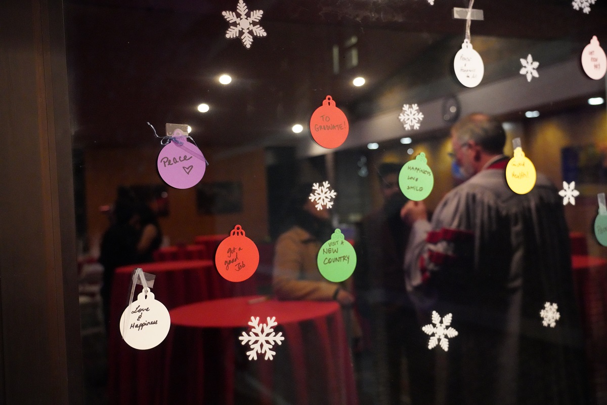 Paper cut-outs of ornaments with text written on them