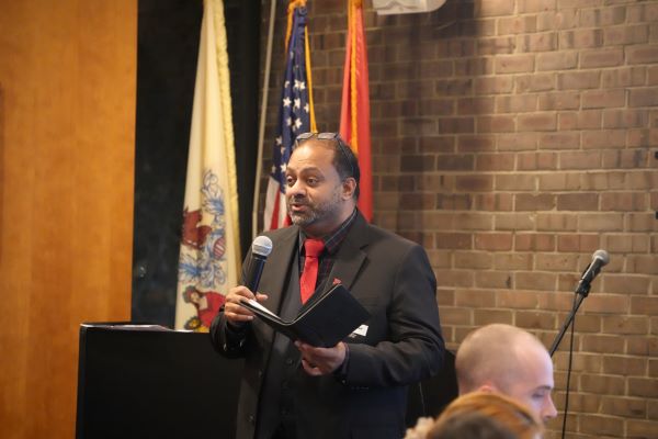 man speaking into microphone