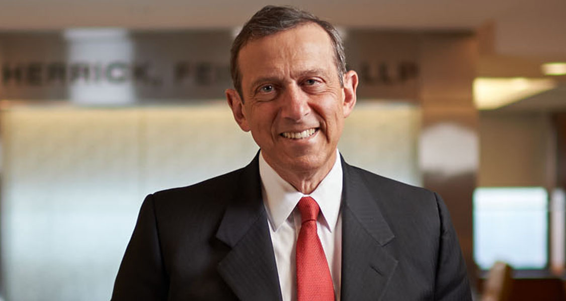 Professional headshot of a man