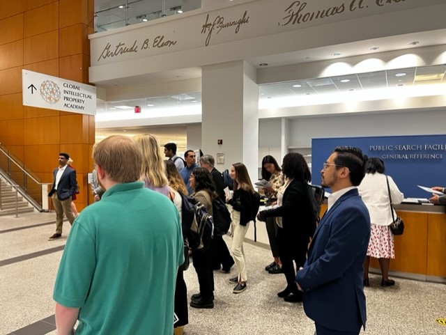 students walking around United States Patent and Trademark Office.