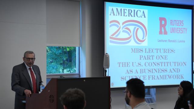 A professor presenting to the class