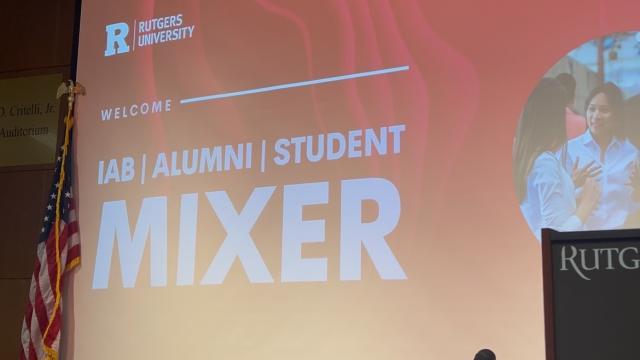 photo of screen with title of event
