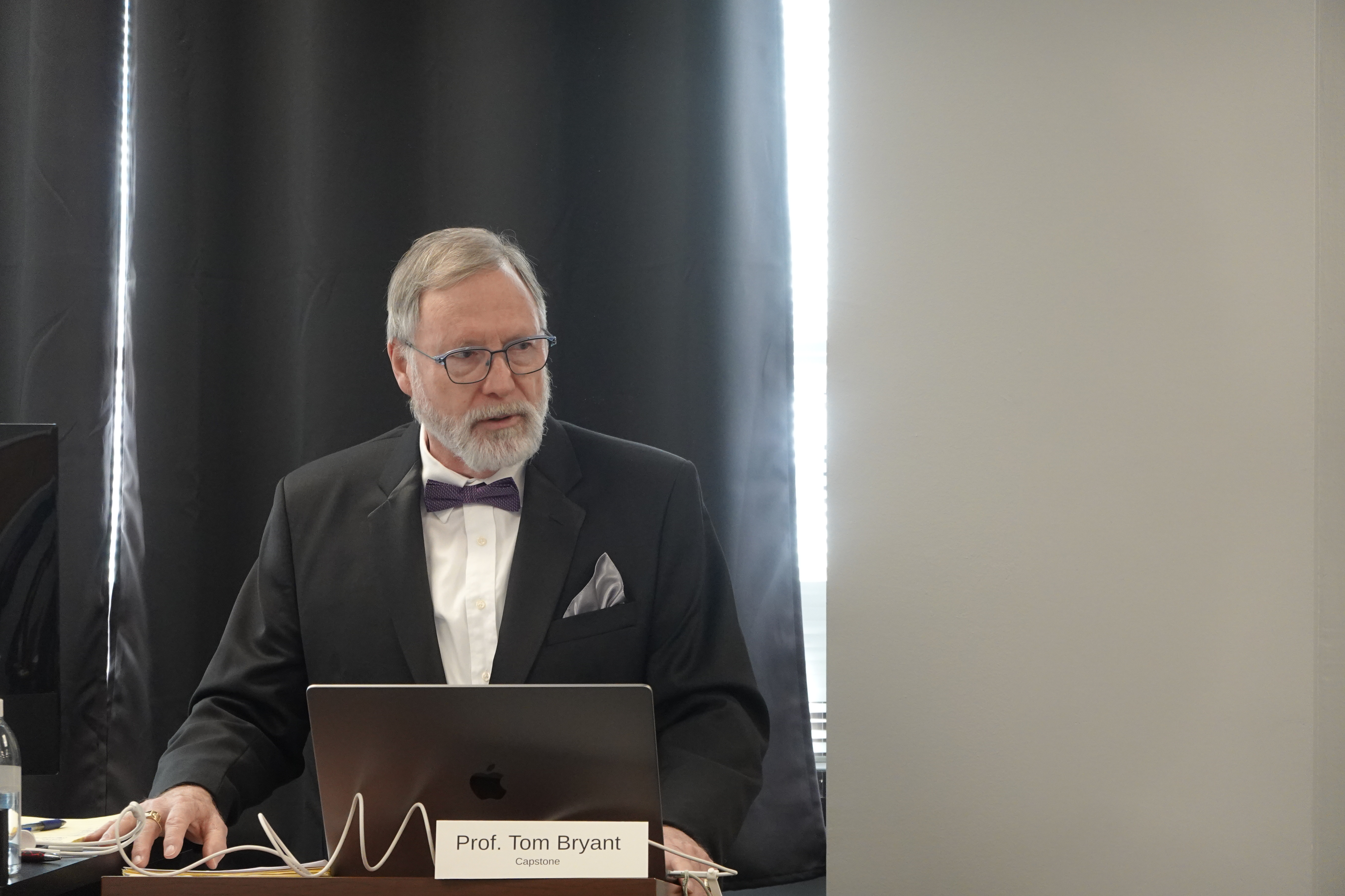 Man standing at podium