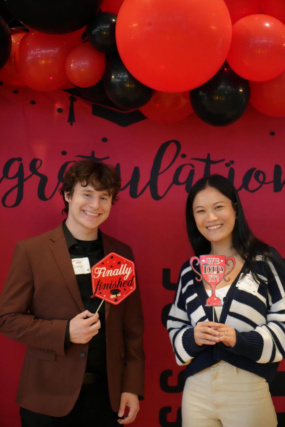 students standing in front of backdrop