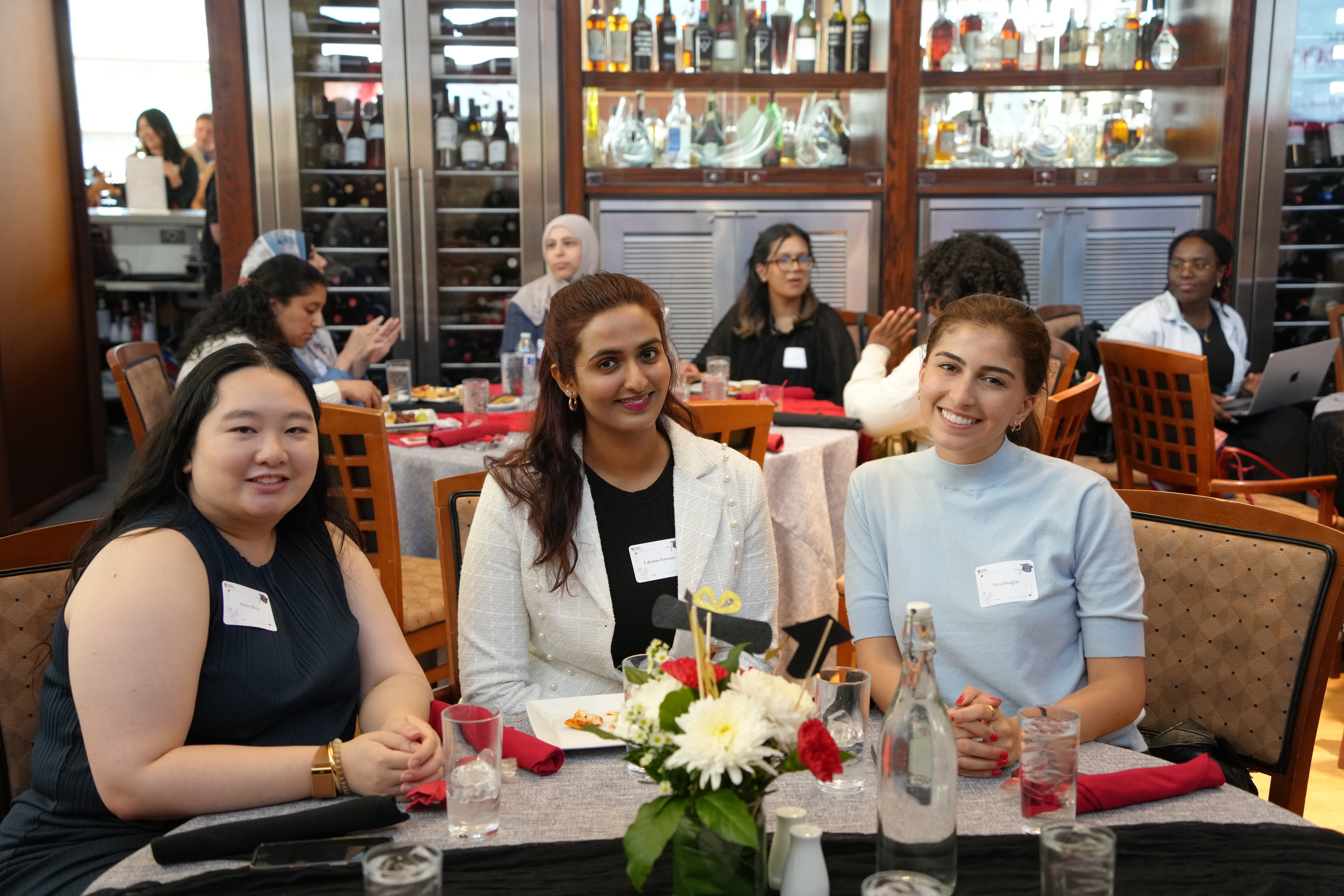 group of women sitting at table
