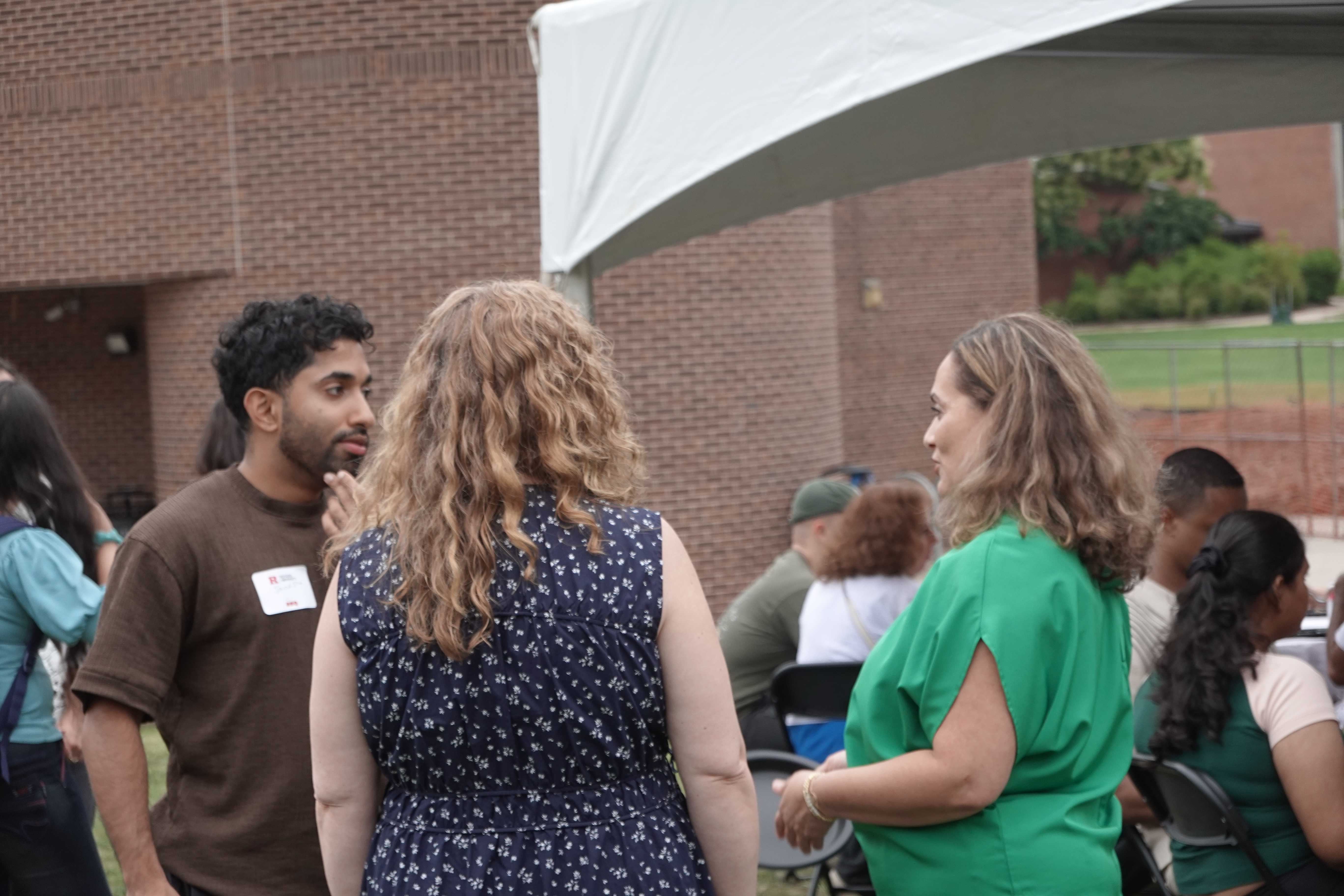 candid photo of people talking