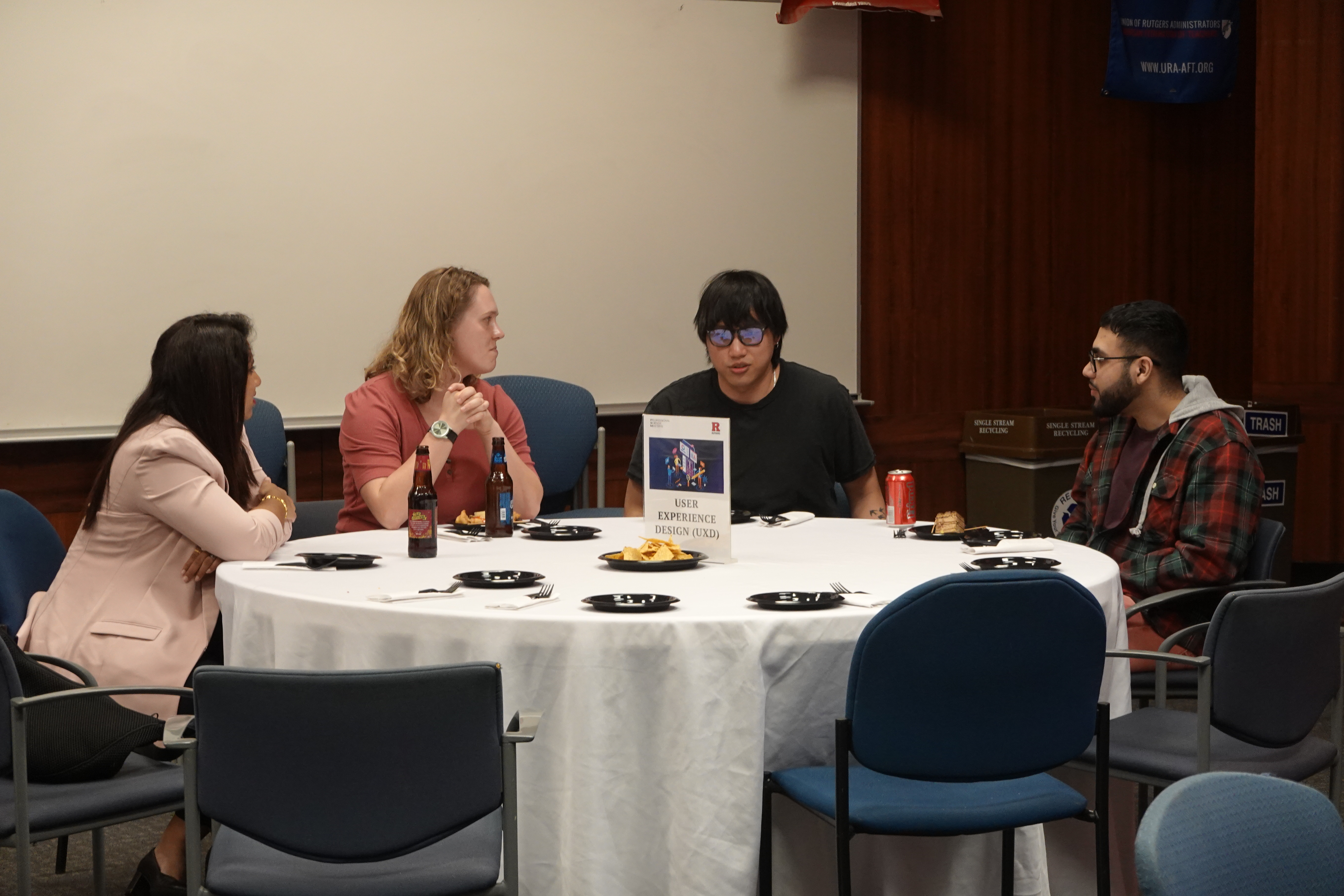 people sitting at table talking