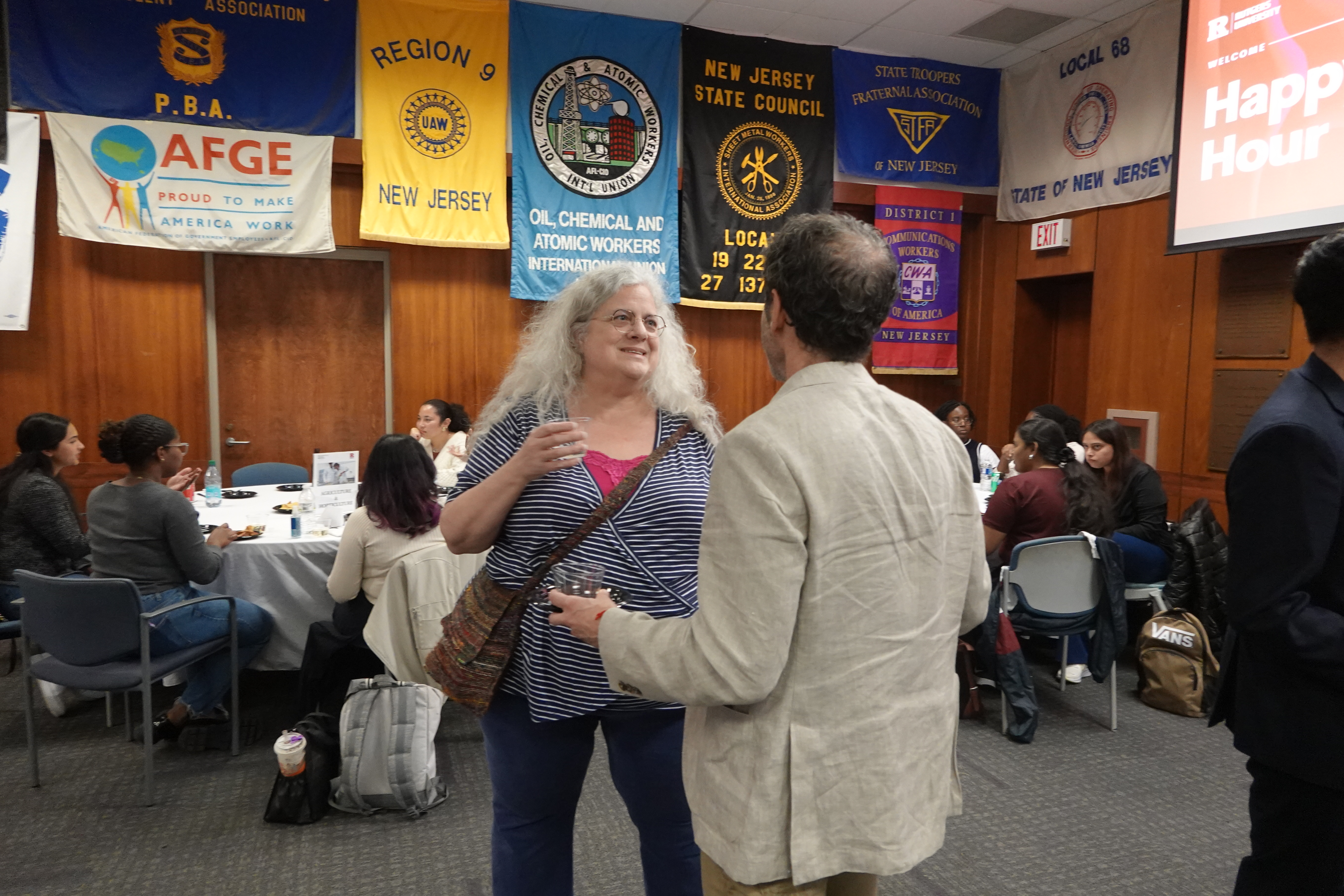 two faculty talking