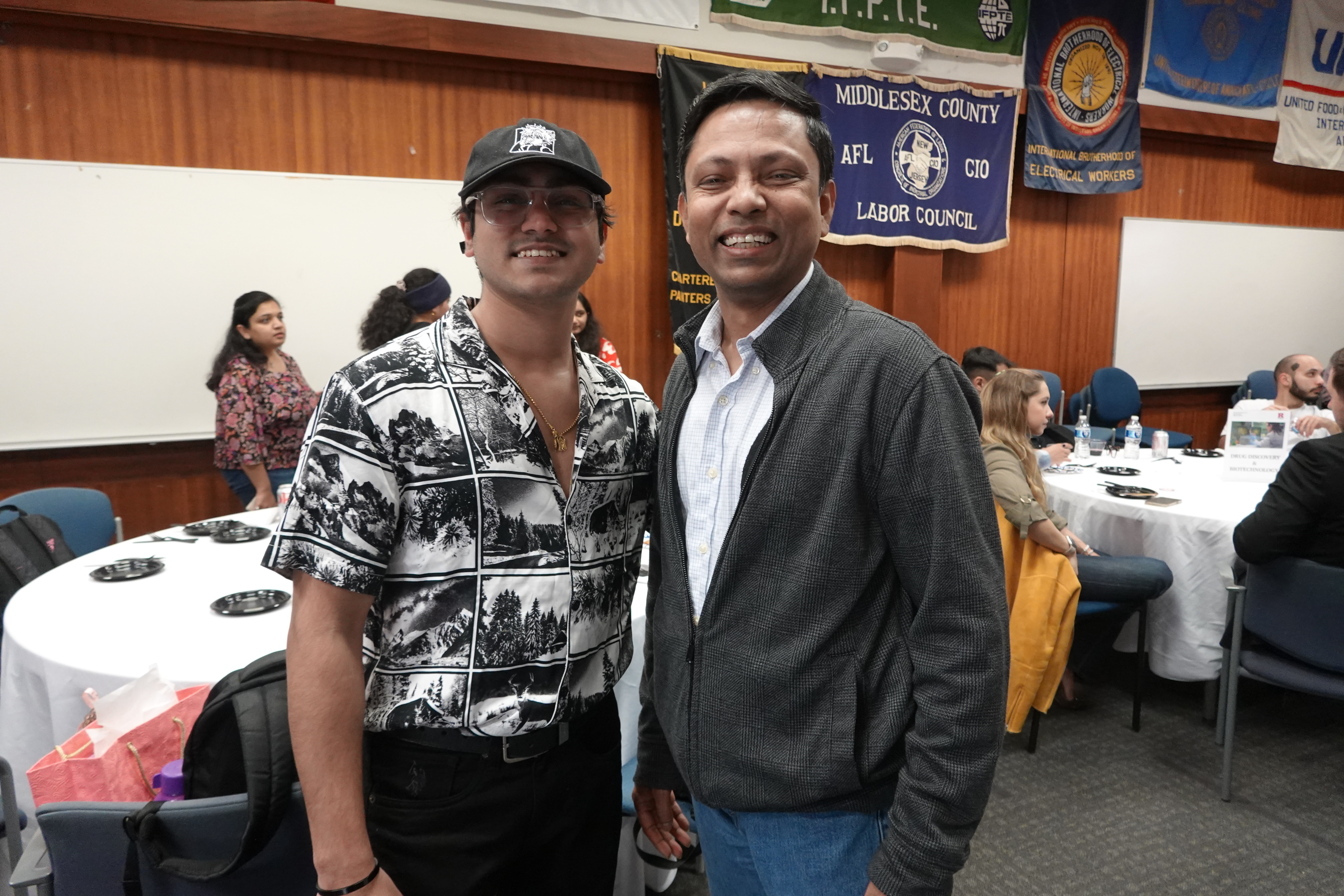 two people smiling at camera