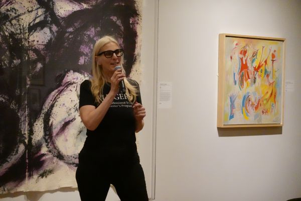 A woman speaking at an event