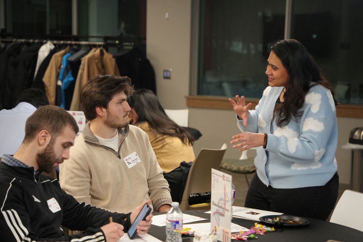 A student explaining something to another student