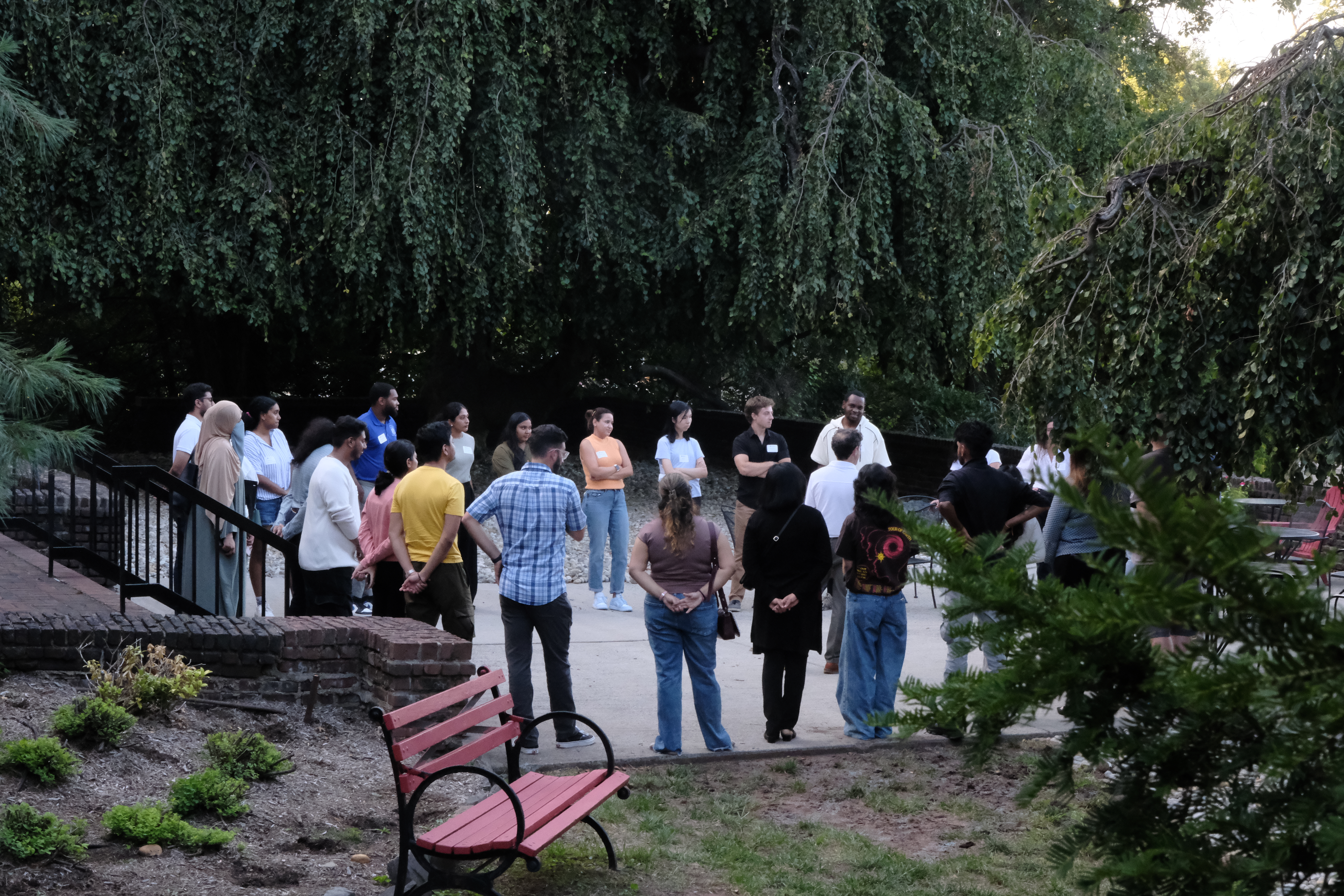 group of students in circle outside