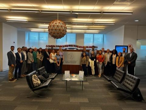Group of students, staff and faculty posing in USPTO