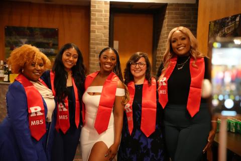 group of graduates smiling