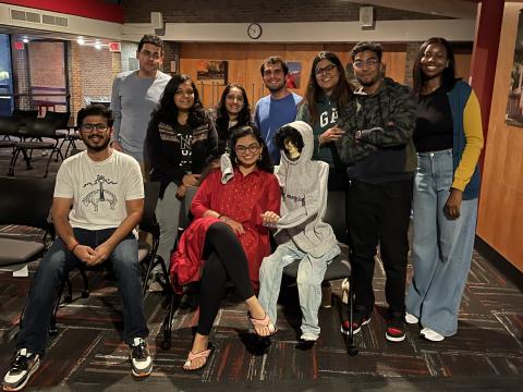 group of students with a plastic skeleton